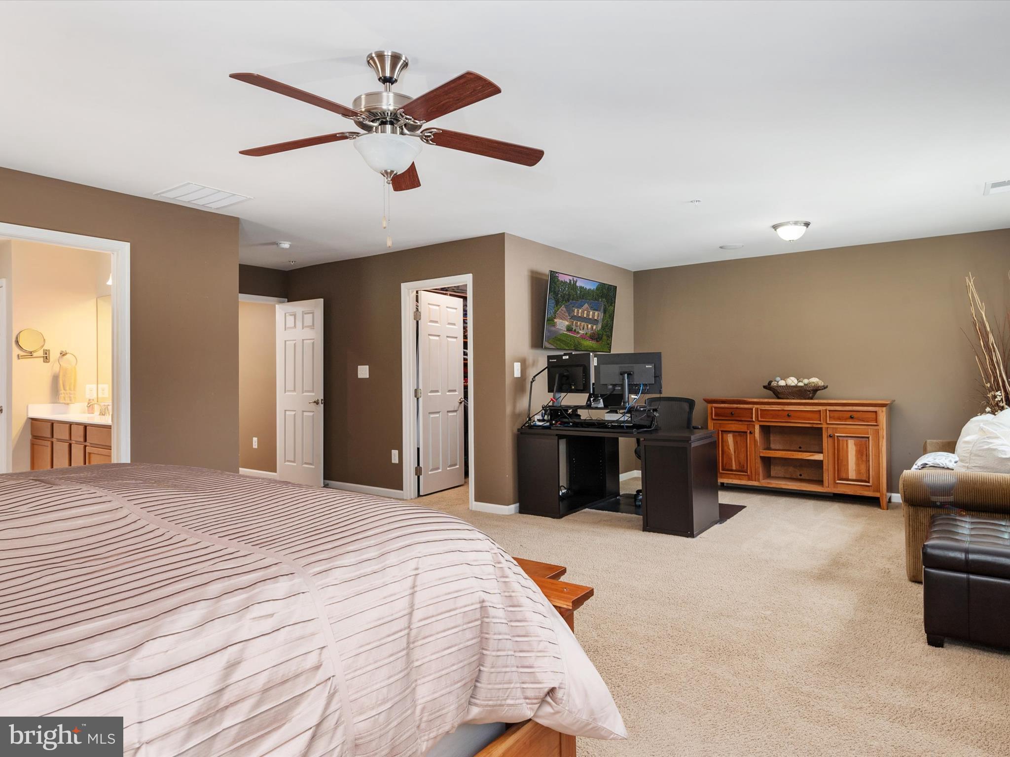 10518 Windlass Run Road Baltimore, MD 21220 - Photo 35 of 71 a bedroom with furniture and a ceiling fan