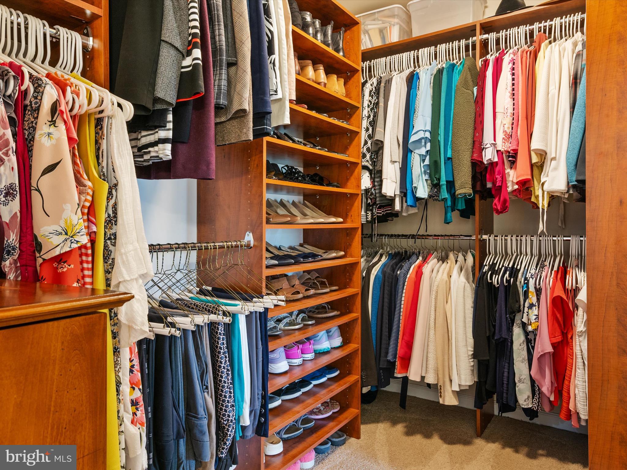 10518 Windlass Run Road Baltimore, MD 21220 - Photo 39 of 71 a view of walk in closet with clothes and shoes