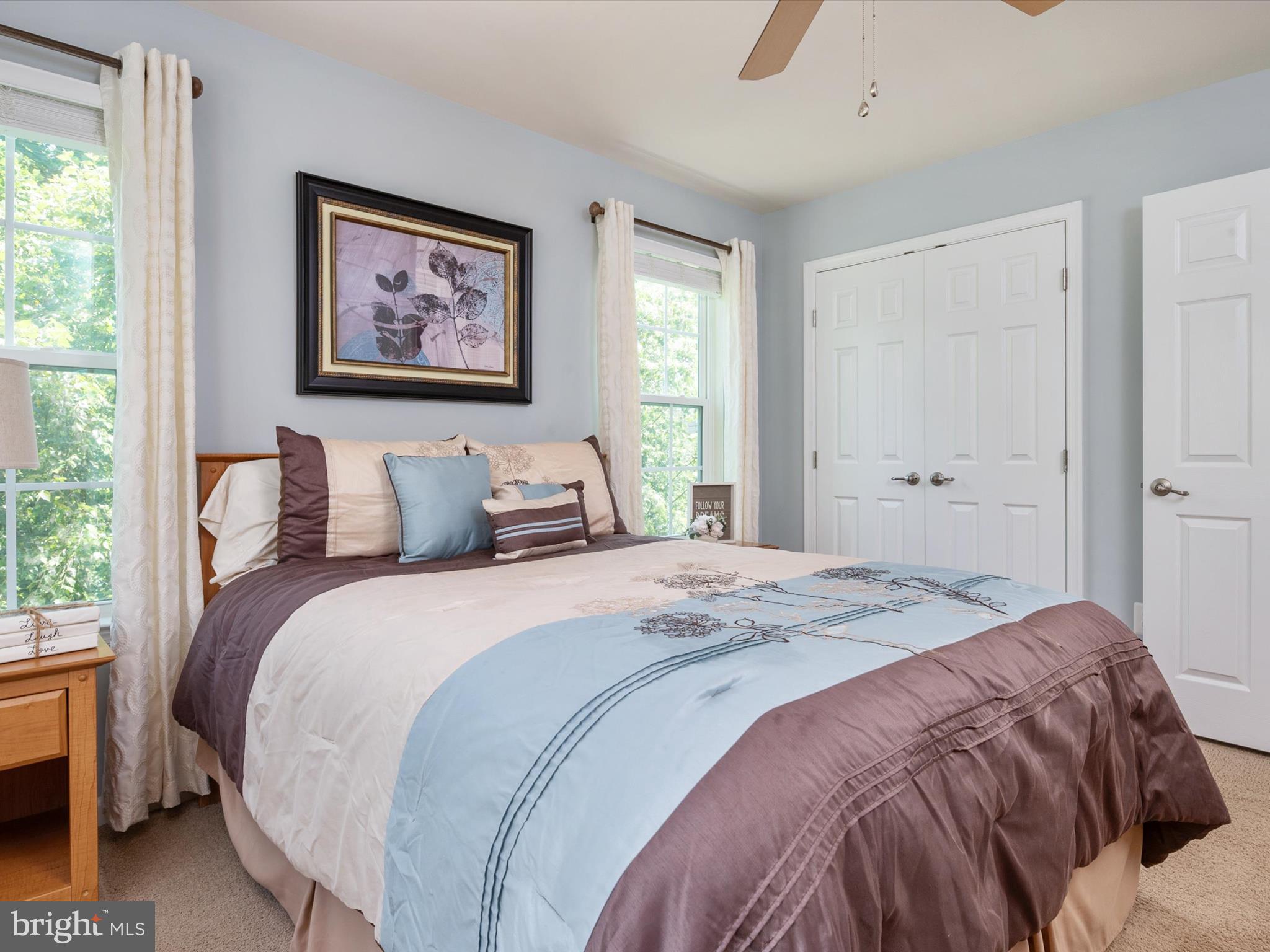 10518 Windlass Run Road Baltimore, MD 21220 - Photo 45 of 71 a bedroom with bed and painting on the wall