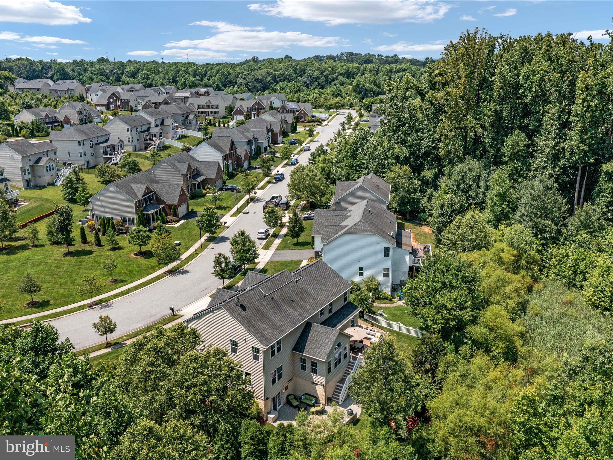 10518 Windlass Run Road Baltimore, MD 21220 - Photo 5 of 71 an aerial view of a house with a yard and lake view
