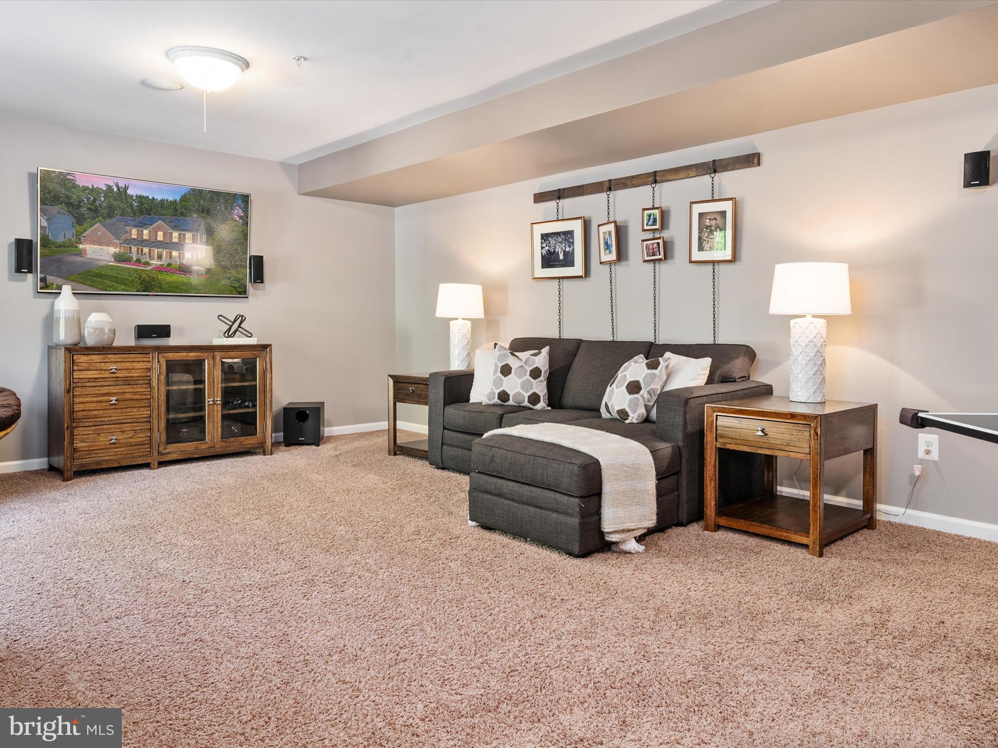 10518 Windlass Run Road Baltimore, MD 21220 - Photo 52 of 71 a bedroom with a bed and a flat screen tv