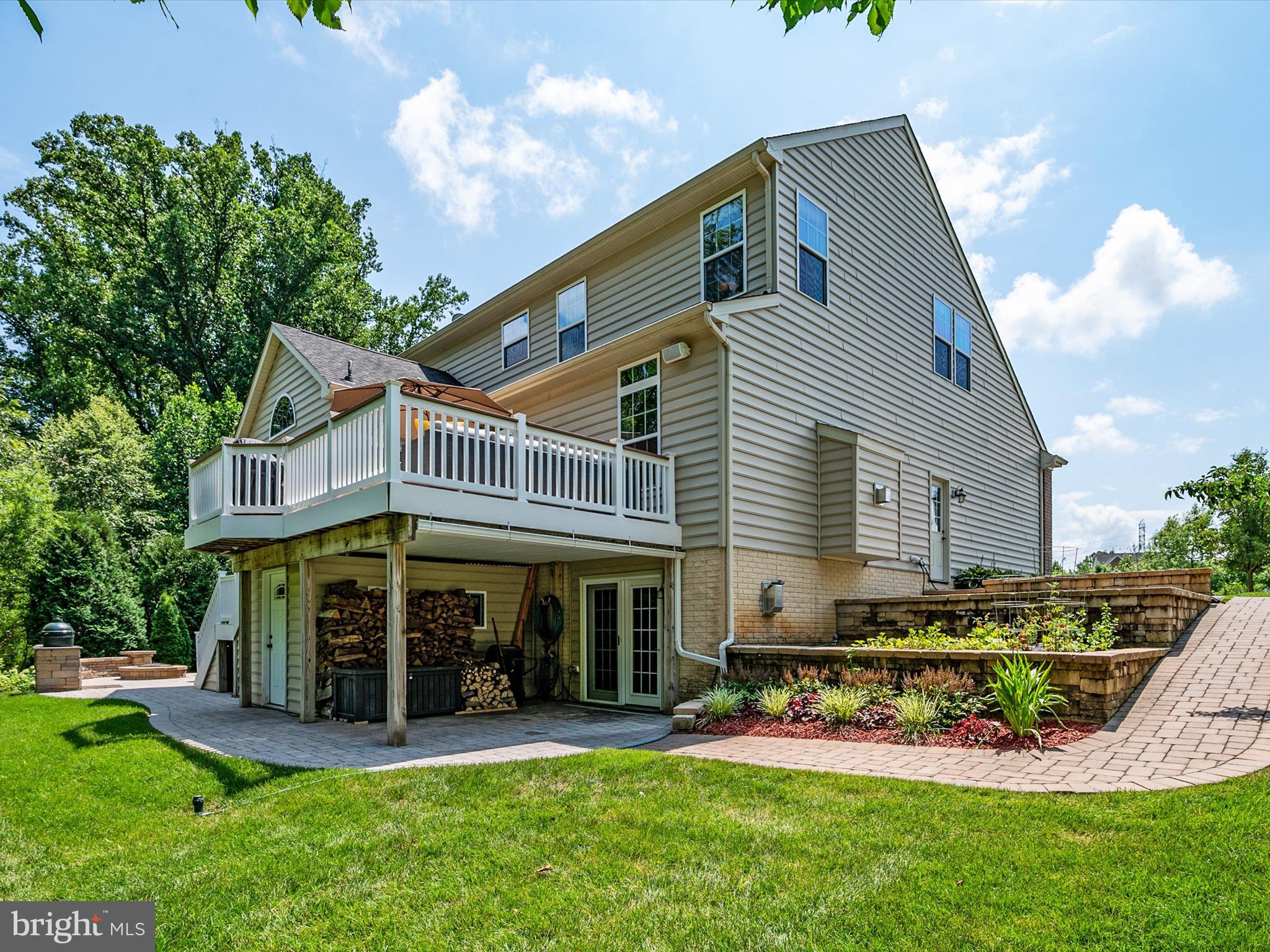 10518 Windlass Run Road Baltimore, MD 21220 - Photo 57 of 71 a view of a house with a yard porch and sitting area