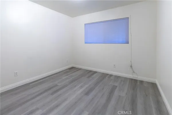 an empty room with a hallway