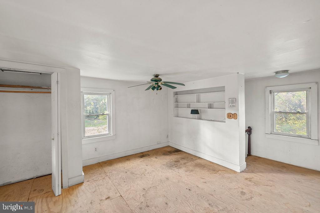 2860 Mayberry Road Taneytown, MD 21787 - Photo 12 of 31 an empty room with windows and cabinet