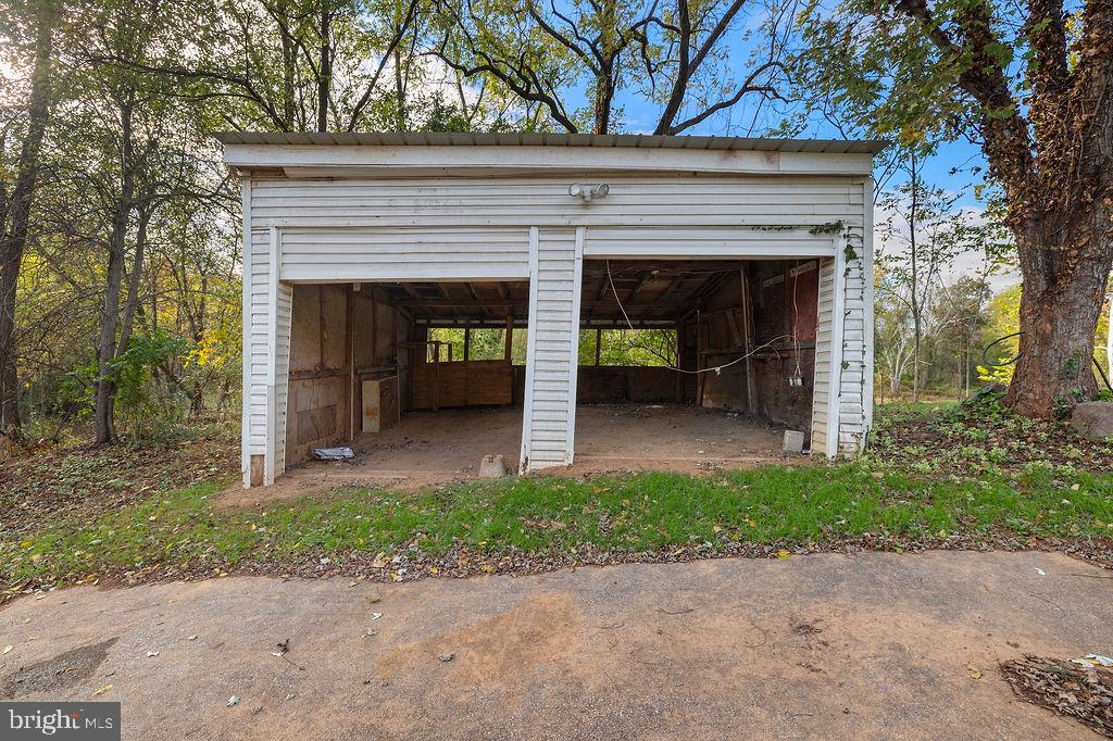 2860 Mayberry Road Taneytown, MD 21787 - Photo 21 of 31 a view of a porch with a fireplace and a large tree
