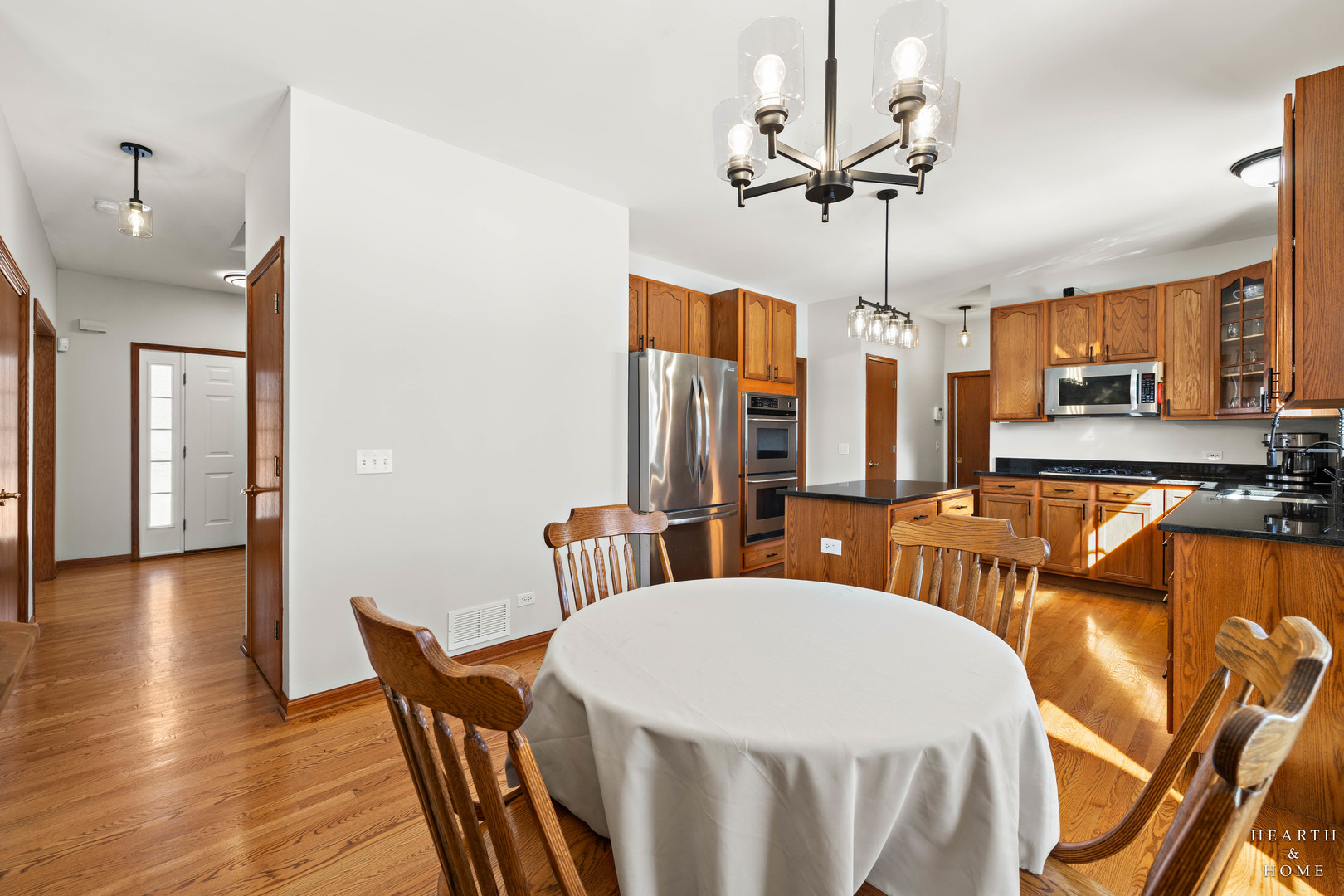 10514 Ridge Lane Marengo, IL 60152 - Photo 8 of 51 a view of a dining room with furniture window and wooden floor