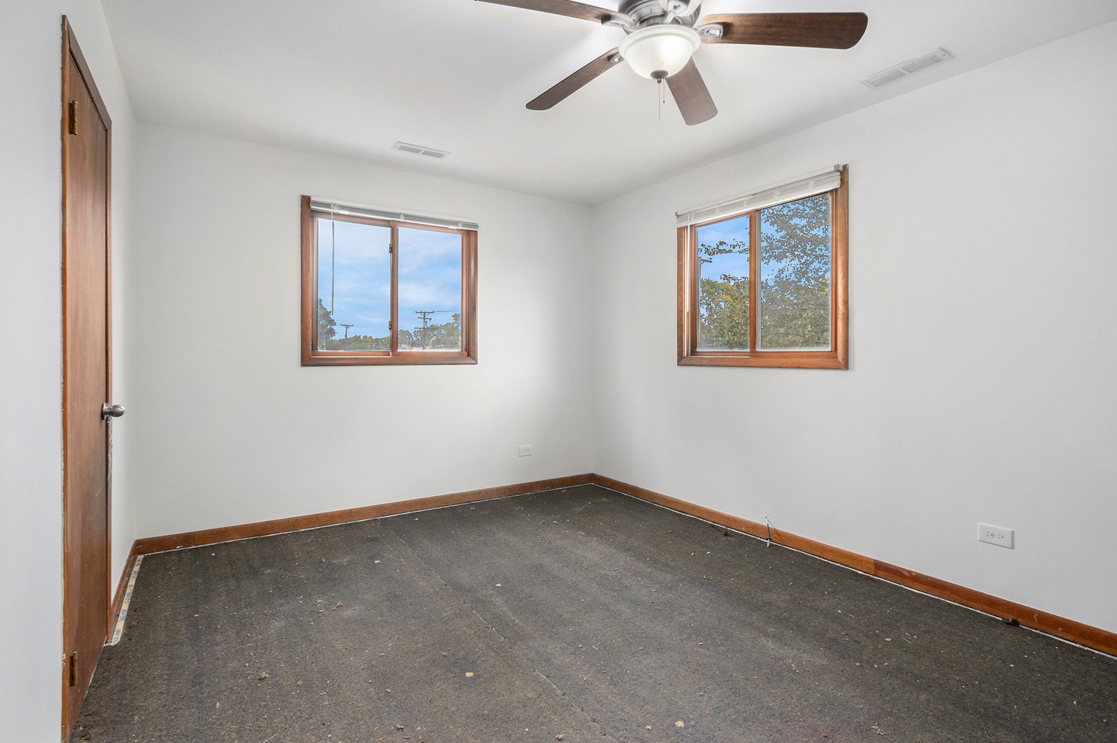17153 Burnham Avenue Lansing, IL 60438 - Photo 11 of 18 a view of an empty room with a window