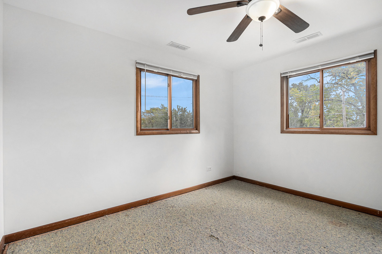 17153 Burnham Avenue Lansing, IL 60438 - Photo 12 of 18 a view of an empty room with a window