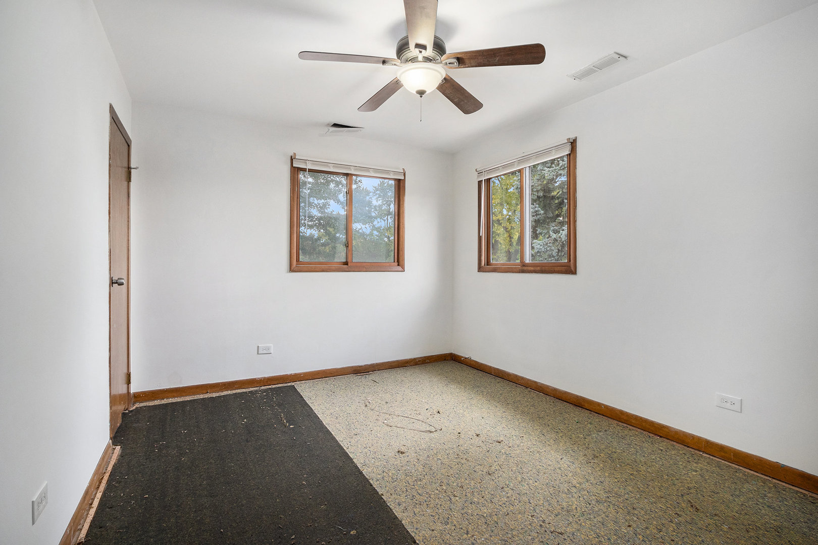17153 Burnham Avenue Lansing, IL 60438 - Photo 10 of 18 a view of an empty room with a window
