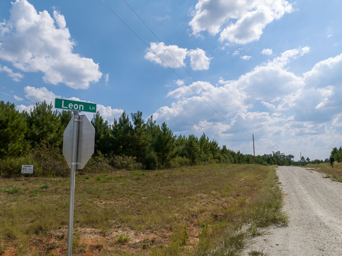 572 Robertson Road Lovelady, TX 75851 - Photo 15 of 16 a view of a lake in front of the house