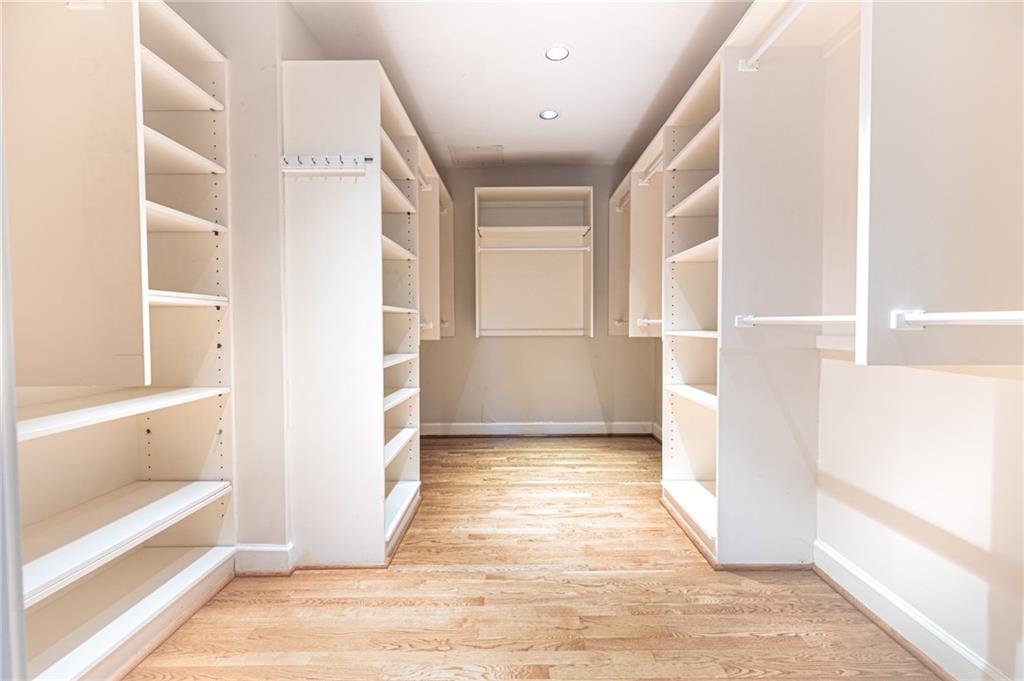 4765 Paran Valley Northwest Atlanta, GA 30327 - Photo 32 of 61 a view of walk in closet with empty racks