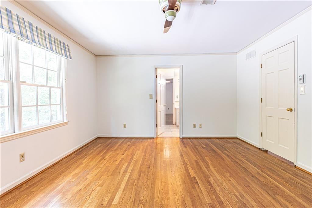 4765 Paran Valley Northwest Atlanta, GA 30327 - Photo 45 of 61 a view of empty room with wooden floor and fan
