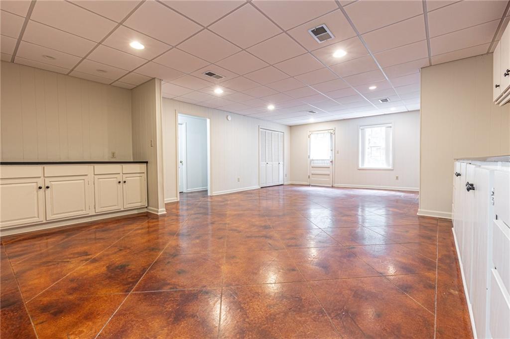 4765 Paran Valley Northwest Atlanta, GA 30327 - Photo 54 of 61 a view of an empty room with window and wooden floor