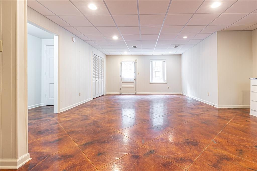 4765 Paran Valley Northwest Atlanta, GA 30327 - Photo 55 of 61 a view of empty room with wooden floor and fan
