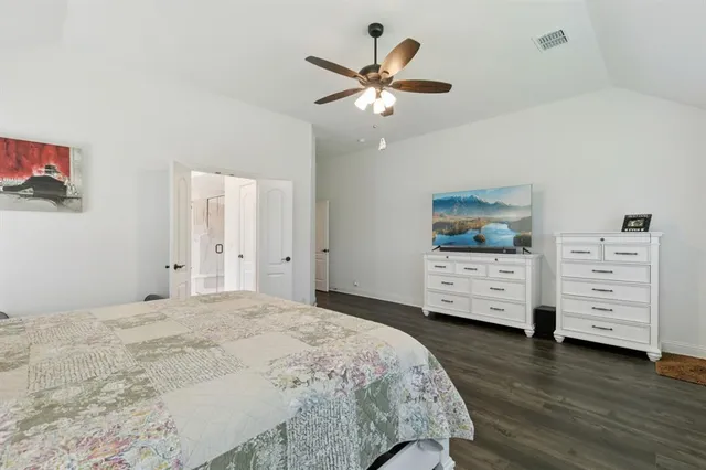 a bedroom with a bed and a closet