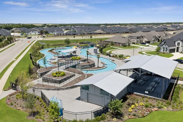 a view of a lake with a yard