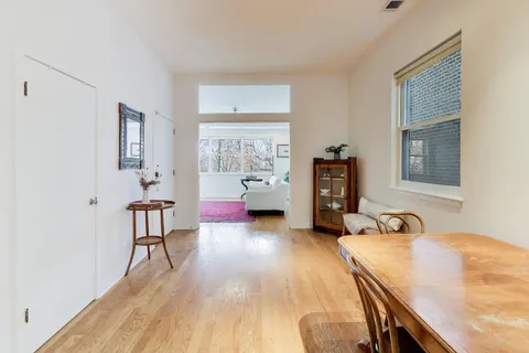 a workspace with furniture and wooden floor