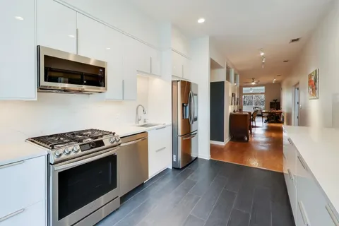 a workspace with furniture and window