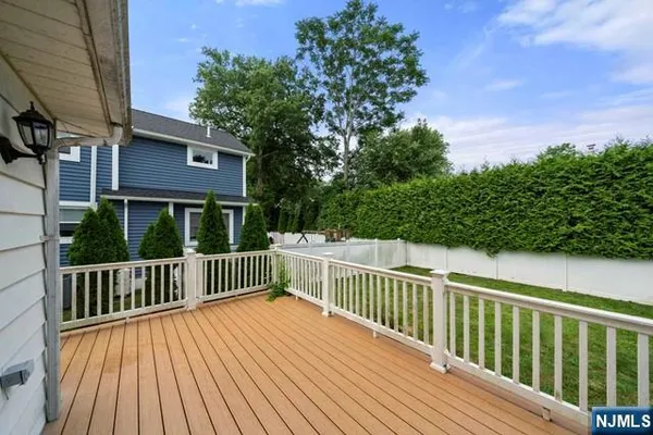 a view of a wooden roof deck