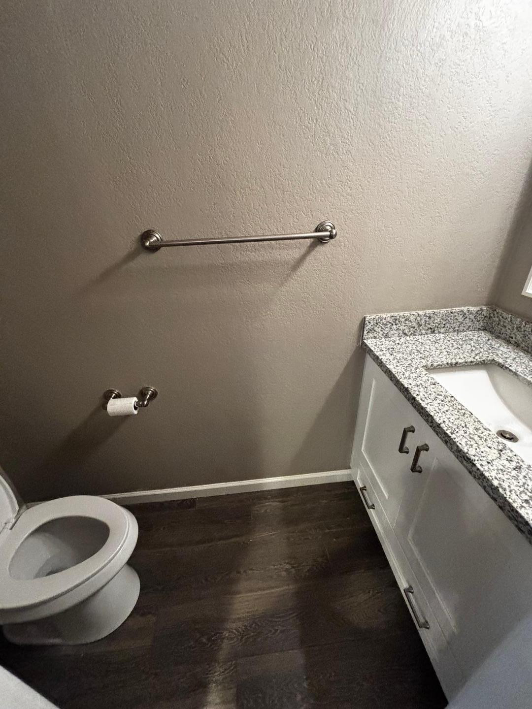 3030 North Hayden Road, Unit 16 Scottsdale, AZ 85251 - Photo 6 of 30 a bathroom with a granite countertop sink and a toilet
