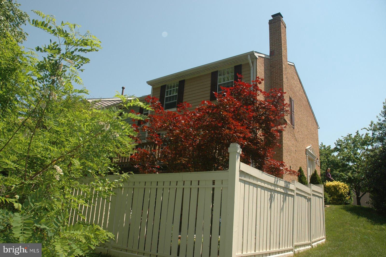 1549 Autumn Ridge Circle Reston, VA 20194 - Photo 32 of 32 Trees with Spring foliage