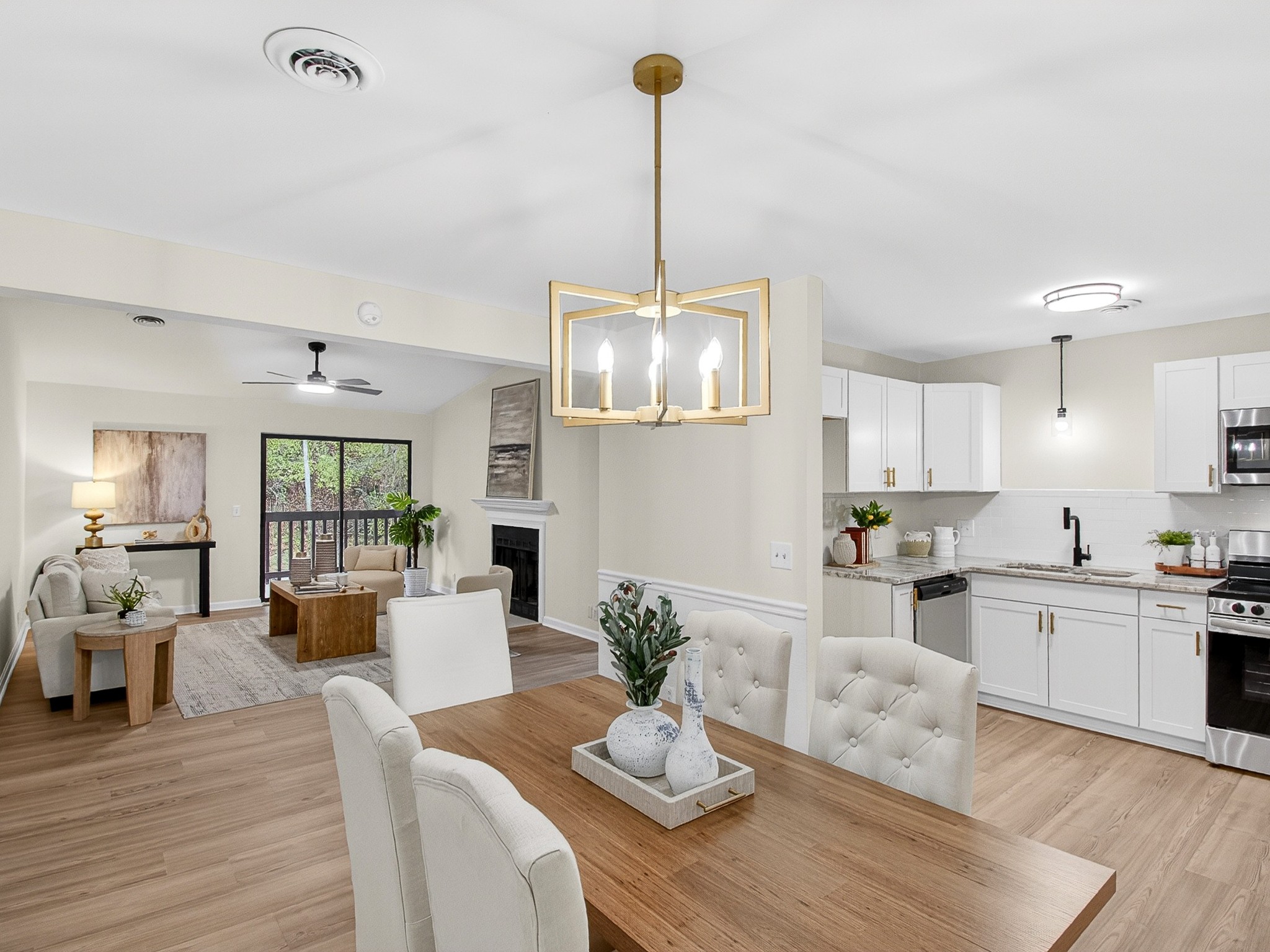 159 Hicks Road Nashville, TN 37221 - Photo 12 of 46 a living room with furniture kitchen view and a wooden floor