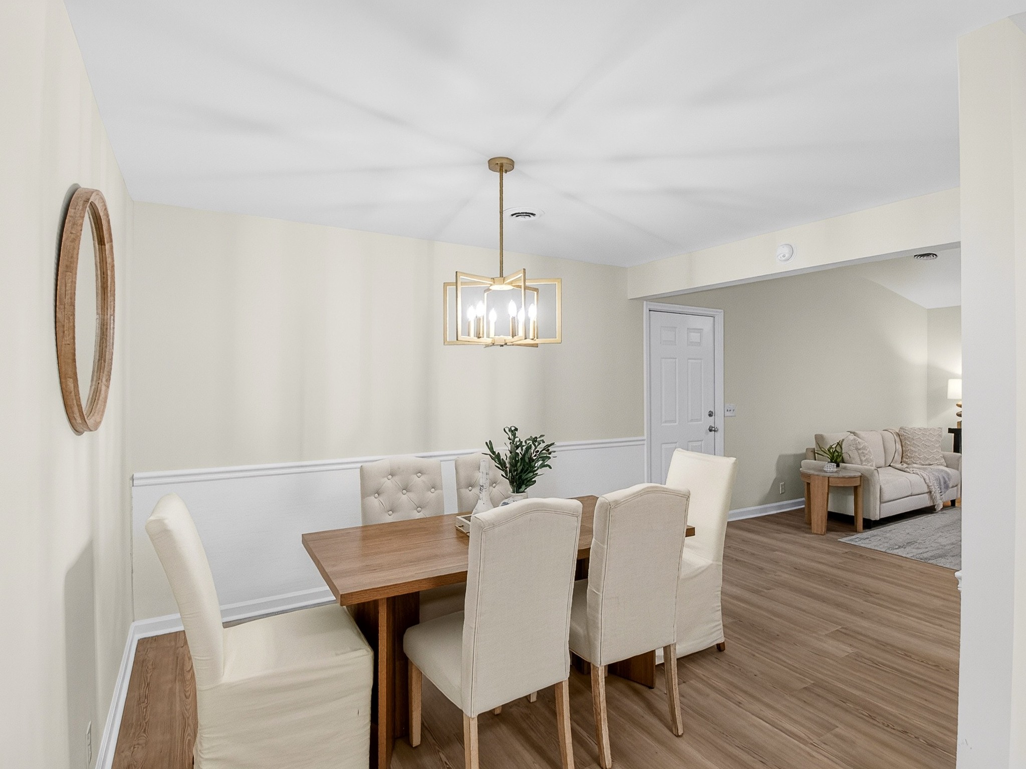 159 Hicks Road Nashville, TN 37221 - Photo 13 of 46 a view of a dining room with furniture wooden floor and chandelier