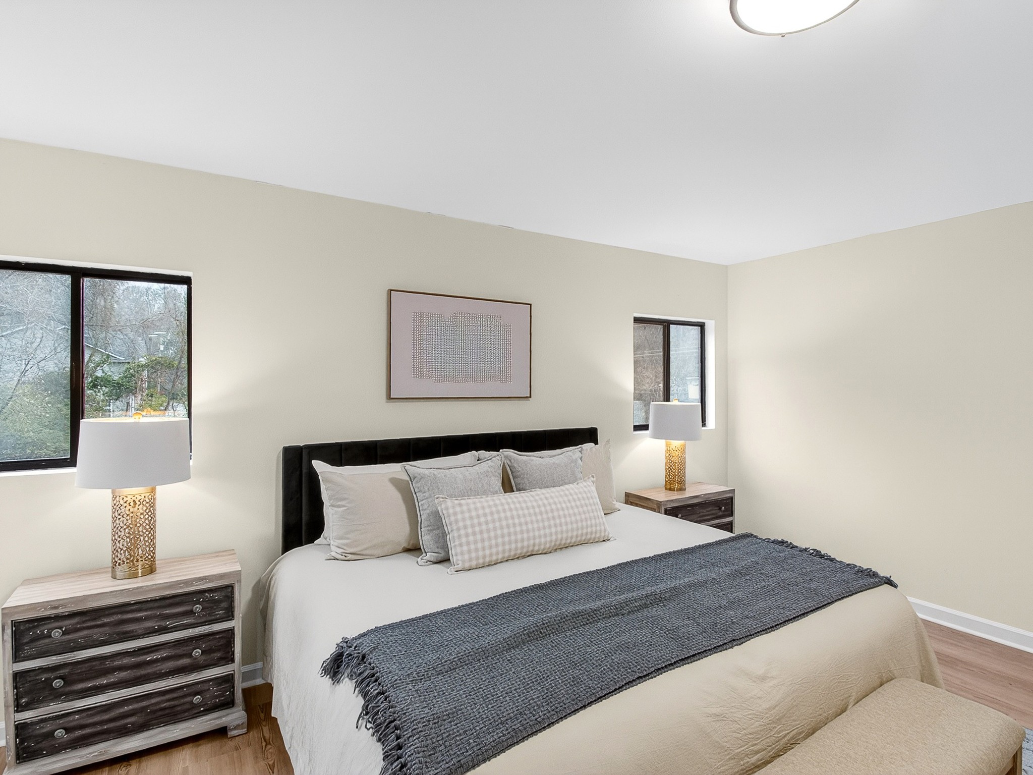 159 Hicks Road Nashville, TN 37221 - Photo 26 of 46 a bedroom with a bed and wooden floor