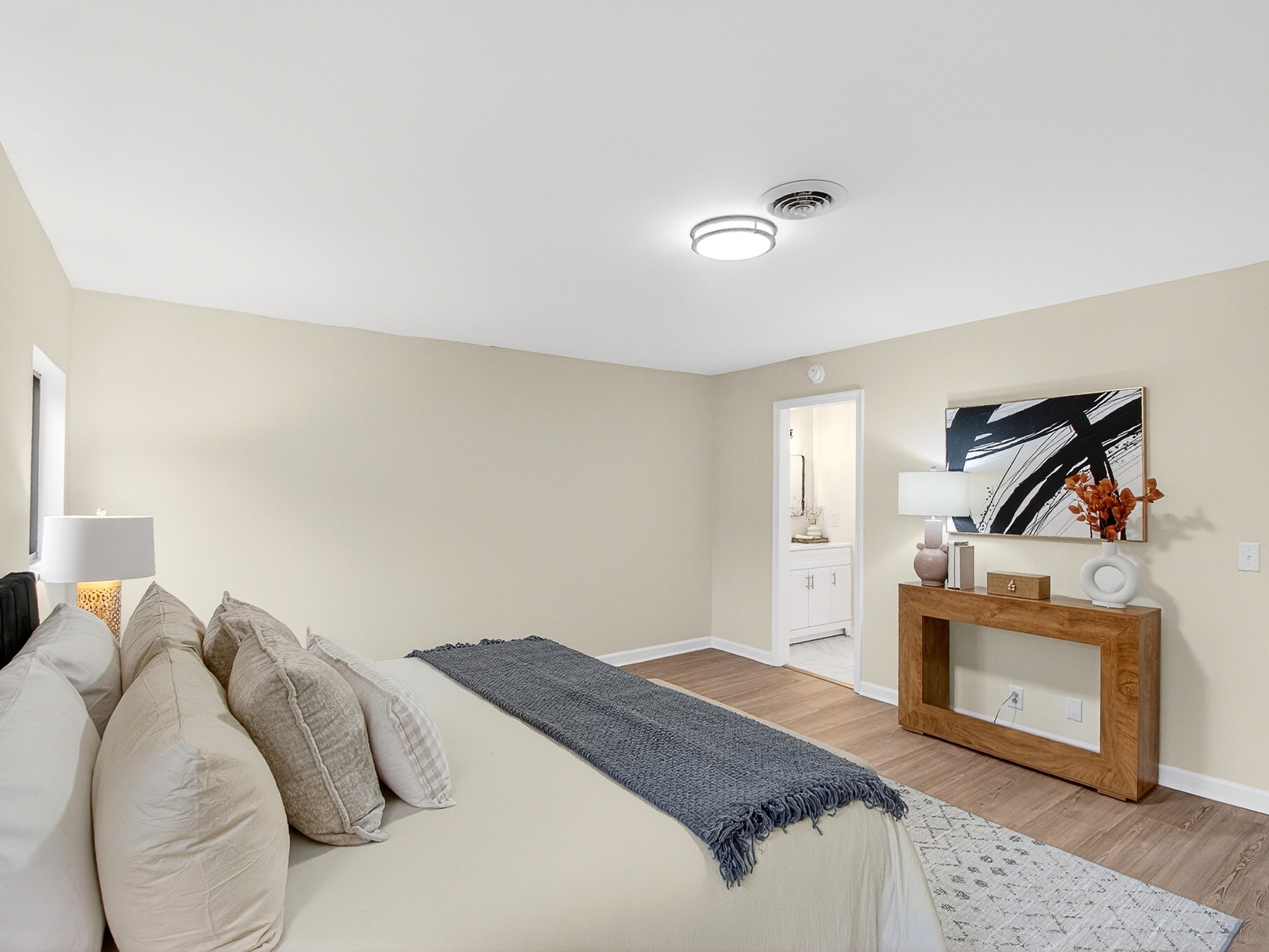 159 Hicks Road Nashville, TN 37221 - Photo 27 of 46 a bedroom with a bed and a fireplace