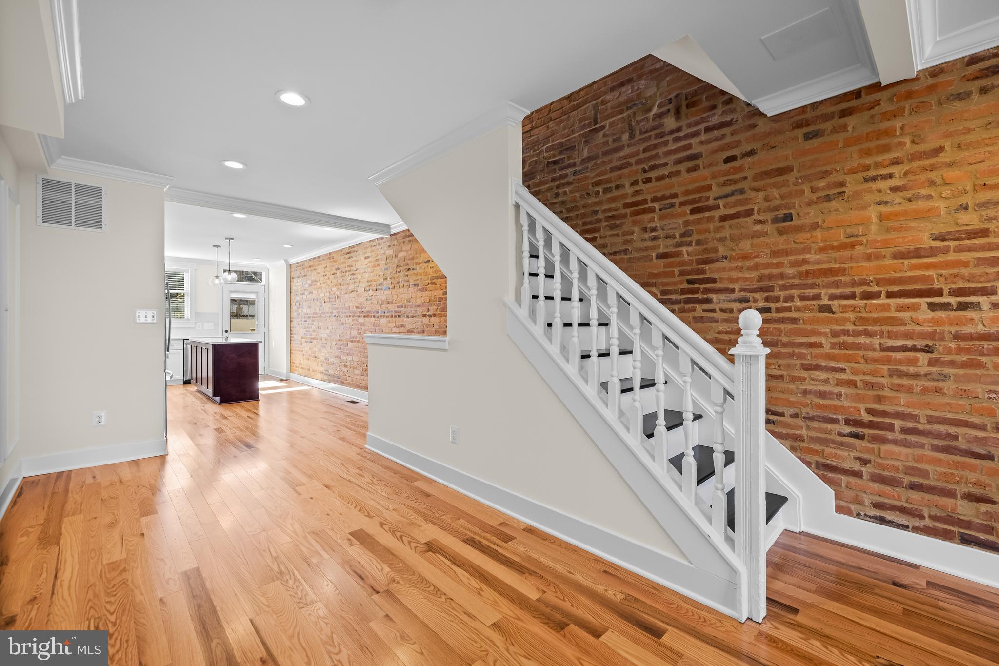 1317 Webster Street Baltimore, MD 21230 - Photo 7 of 32 a view of entryway with wooden floor
