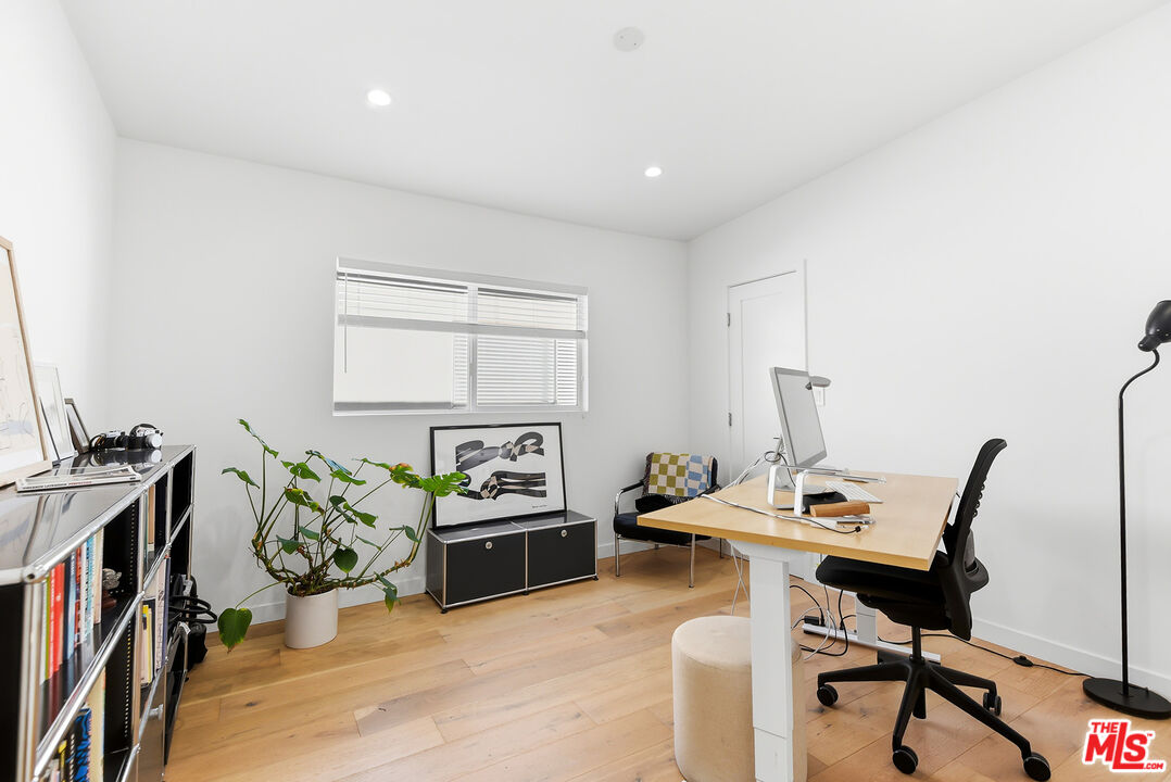 2603 Abbot Kinney Boulevard, Unit 1/2 Venice, CA 90291 - Photo 13 of 16 a view of a workspace with furniture and a window