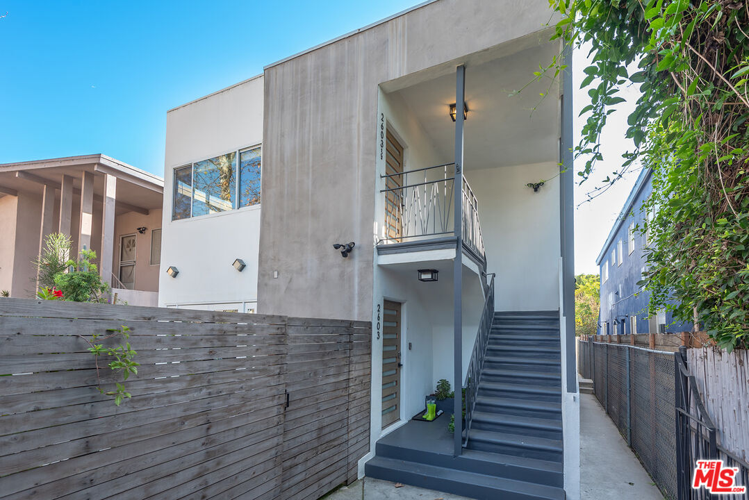2603 Abbot Kinney Boulevard, Unit 1/2 Venice, CA 90291 - Photo 16 of 16 a view of a porch with wooden floor and stairs