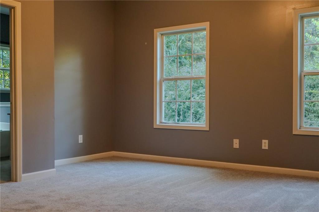 169 Rachel Boulevard Temple, GA 30179 - Photo 14 of 22 an empty room with windows