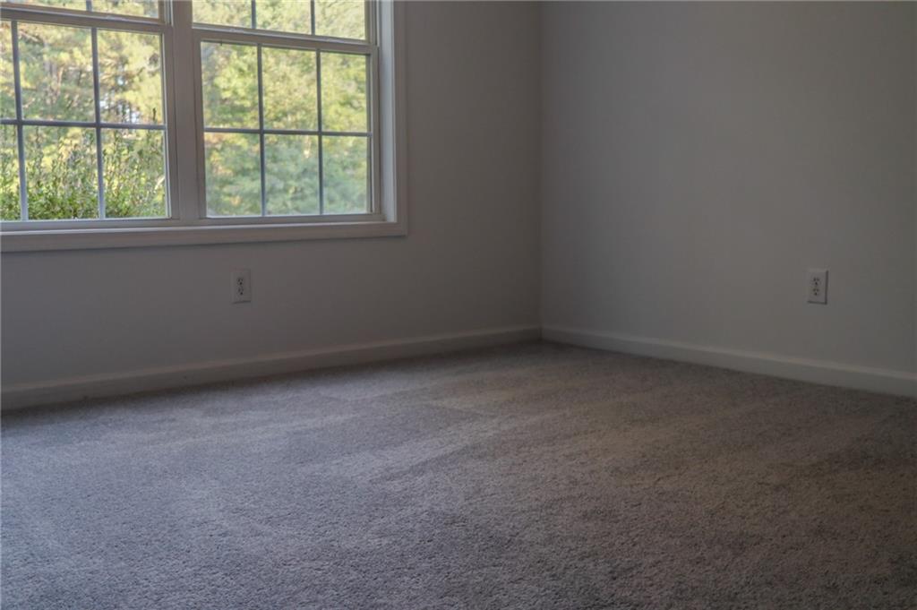 169 Rachel Boulevard Temple, GA 30179 - Photo 18 of 22 an empty room with a window