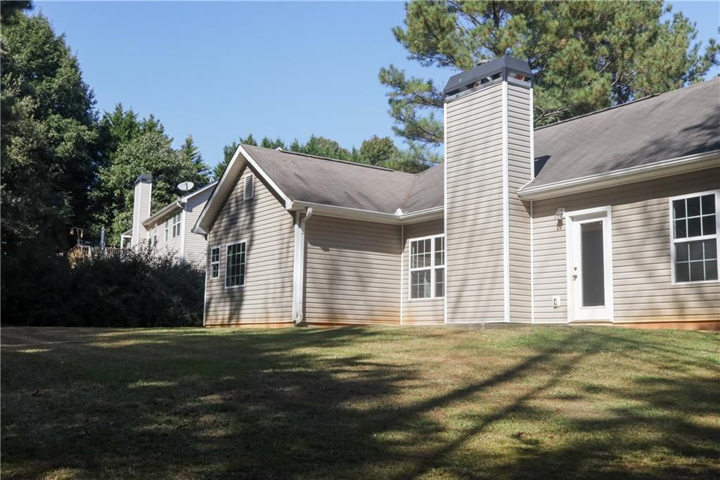 169 Rachel Boulevard Temple, GA 30179 - Photo 21 of 22 a front view of a house with a garden