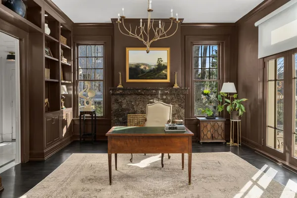 a kitchen with a sink a stove and cabinets