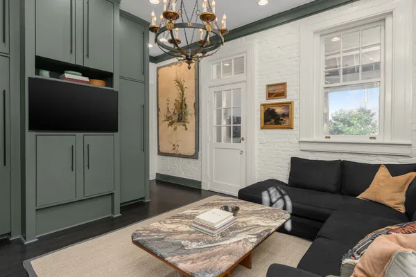 a view of cabinets and wooden floor