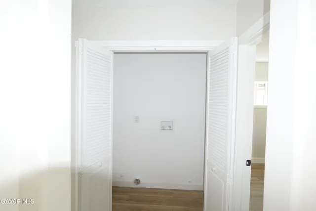 a bathroom with a sink vanity and a mirror