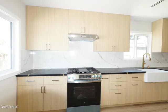 a house view with a outdoor space