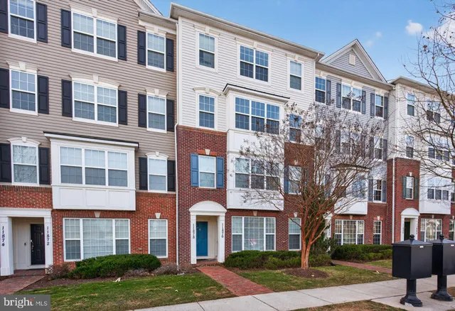 a front view of a building with yard