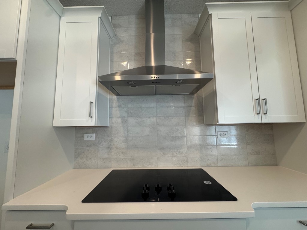 96040 Pirates Bluff Road Yulee, FL 32097 - Photo 5 of 10 a kitchen with a sink and cabinets