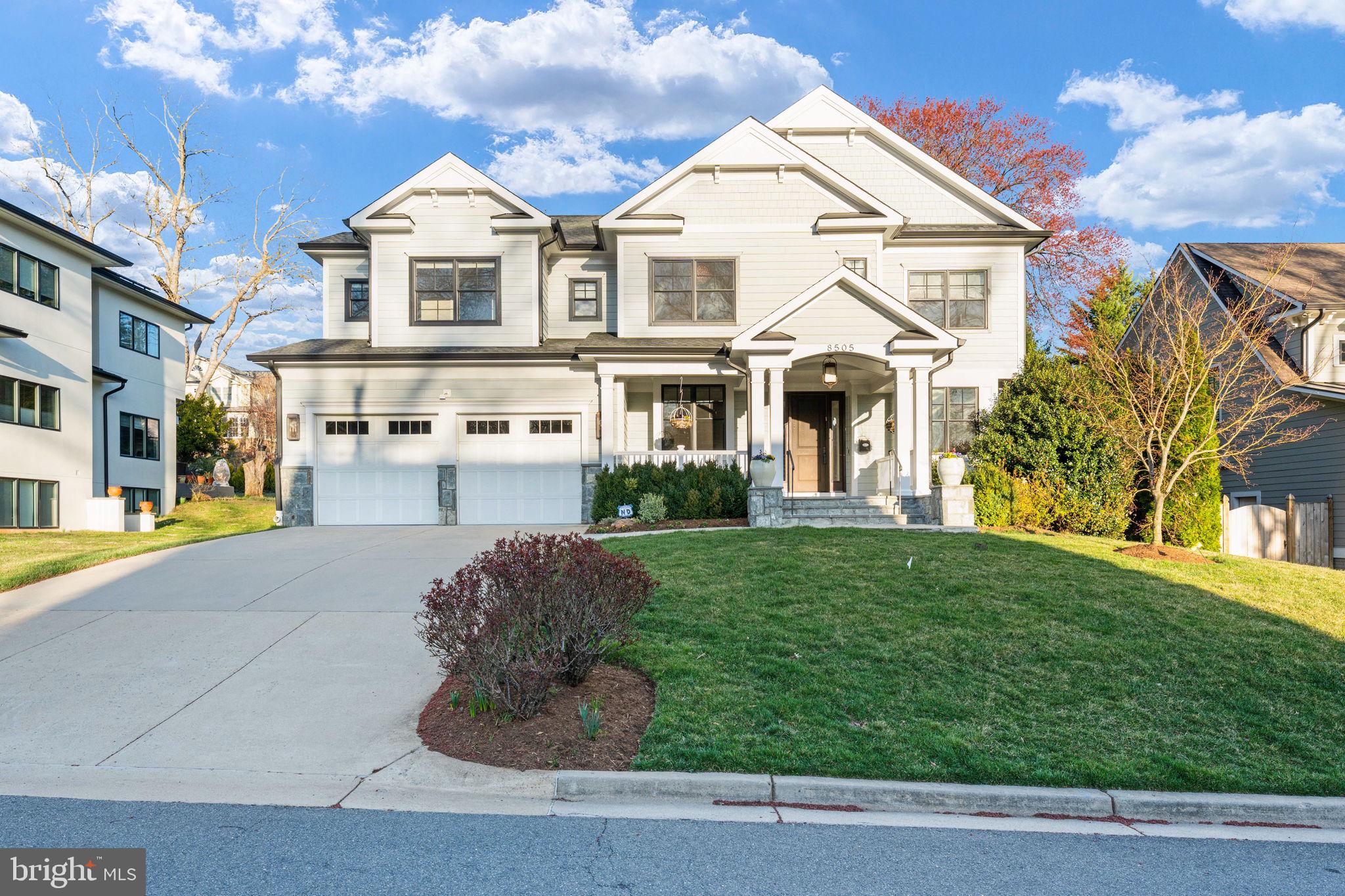 8505 Rayburn Road Bethesda, MD 20817 - Photo 1 of 49 a front view of a house with a yard