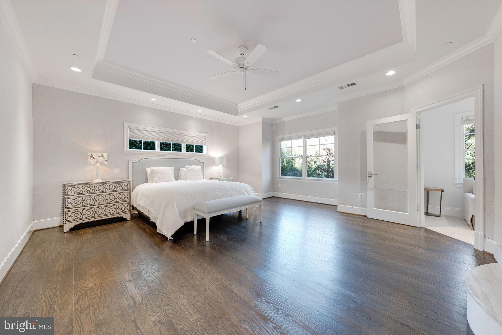 8505 Rayburn Road Bethesda, MD 20817 - Photo 21 of 49 a spacious bedroom with a bed and a window