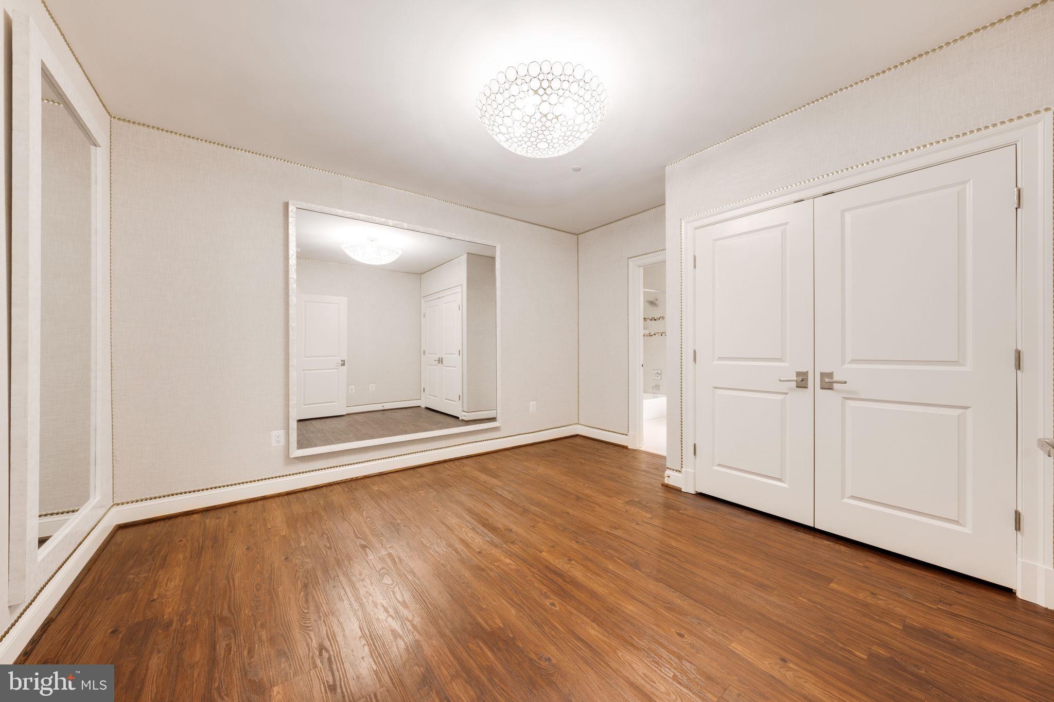 8505 Rayburn Road Bethesda, MD 20817 - Photo 41 of 49 an empty room with wooden floor