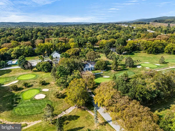a view of a yard with an outdoor space