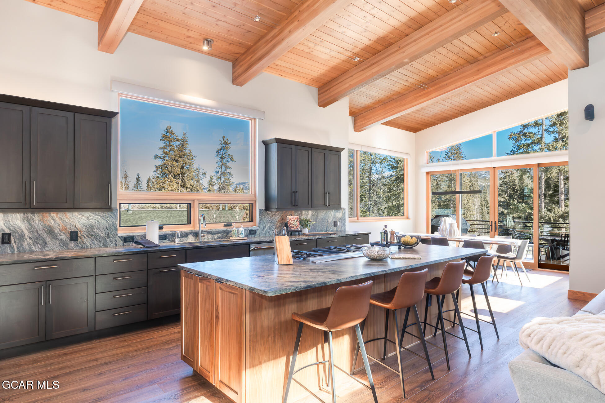 684 Vasquez Road Winter Park, CO 80482 - Photo 12 of 45 a view of a dining room with furniture and wooden floor