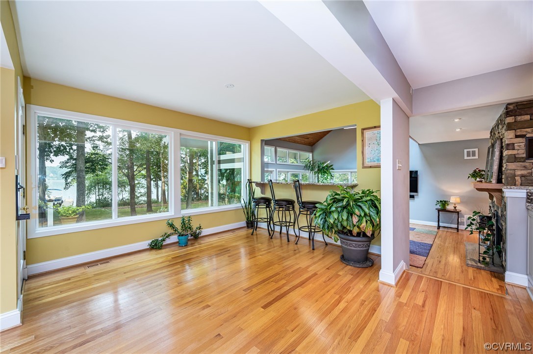 13714 Winterberry Ridge Midlothian, VA 23112 - Photo 12 of 49 a view of a room with wooden floor and outdoor space