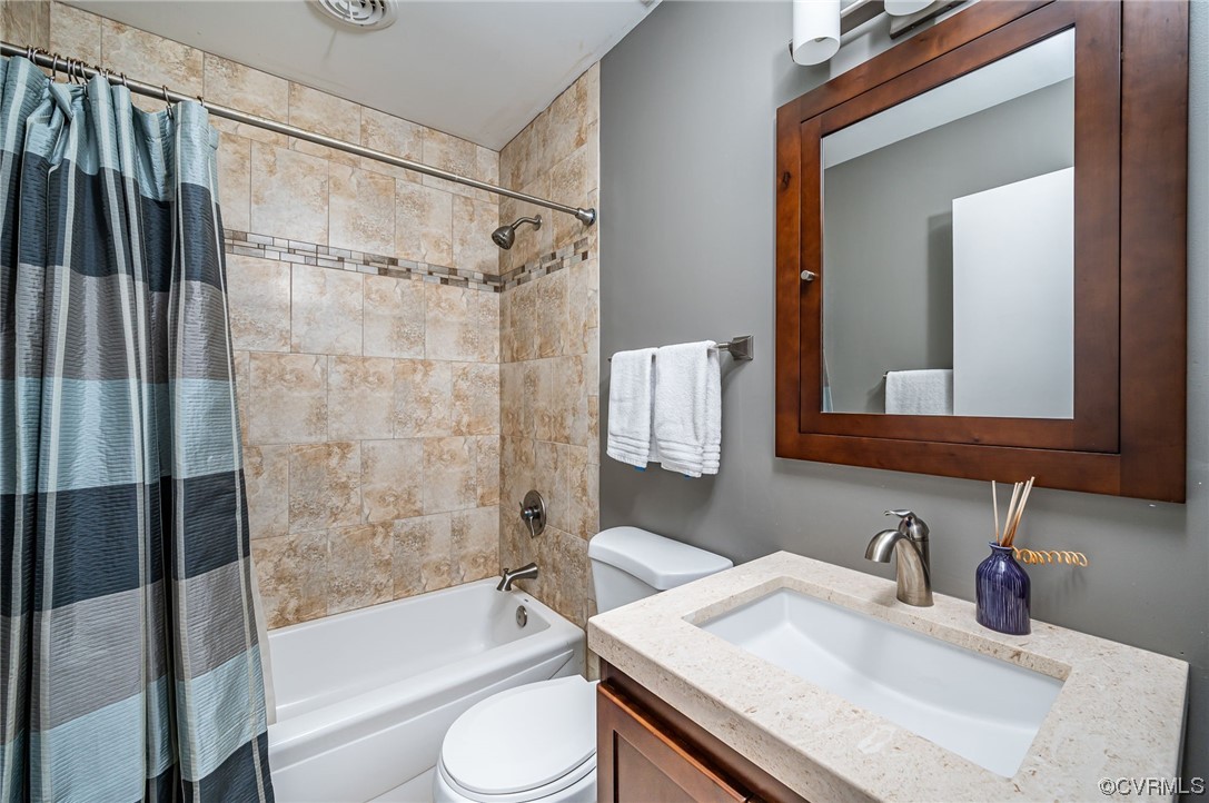 13714 Winterberry Ridge Midlothian, VA 23112 - Photo 30 of 49 a bathroom with a granite countertop sink toilet and shower