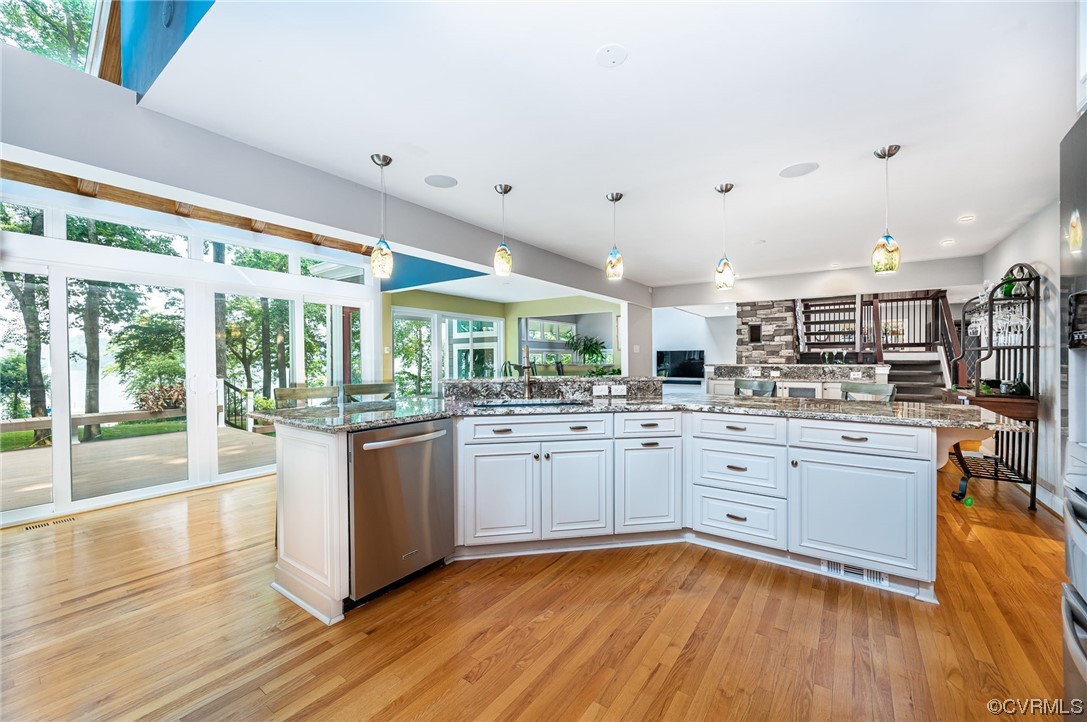 13714 Winterberry Ridge Midlothian, VA 23112 - Photo 10 of 49 a kitchen with stainless steel appliances granite countertop a stove and cabinets