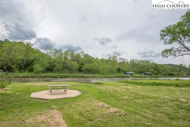 a view of lake with green space